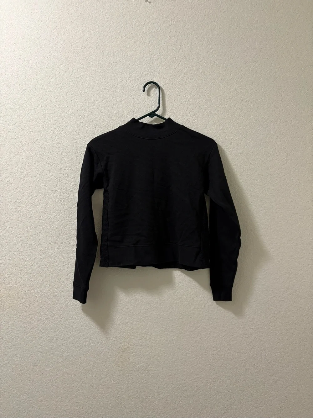 Kate Spade New York women’s black pullover mock neck sweatshirt. Size XXS. NWOT